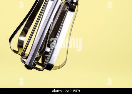 Stainless steel, manual egg beater, or food mixer. Stock Photo
