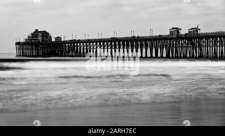 Oceanside California USA. Historic Oceanside Pier, Oceanside, San Diego County, California. Slow shutter exposure. Stock Photo