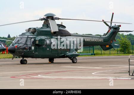 BONN, GERMANY - MAY 22, 2005: German Border patrol Eurocopter AS-332L1 Super Puma helicopter at Bonn-Hangelar airport. Stock Photo
