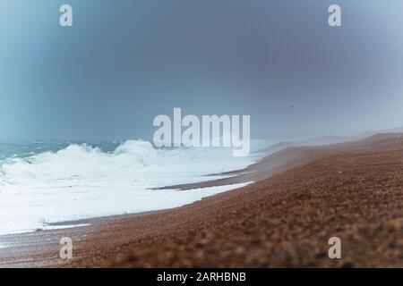 Stormy seas on Chesil Beach Stock Photo