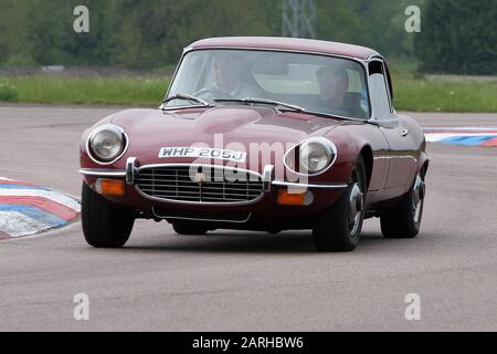 Early 1970s  Jaguar E Type Series 2  2+2  Coupe at Thruxton Circuit, Hampshire in 2006. Stock Photo