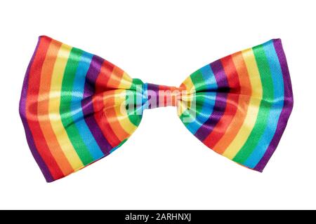 Gift bows. Closeup of a decorative rainbow ribbon bow made of silk for gift box isolated on a white background. Decorations background. Macro photogra Stock Photo