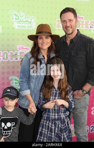 Tiffani Thiessen (L) and her Husband Brady Smith (R) with their kids at the Disney Channel's Premiere of 'Zombies 2' held at the Disney Studios in Burbank, CA, January 25, 2020. Photo by: Richard Chavez / PictureLux Stock Photo