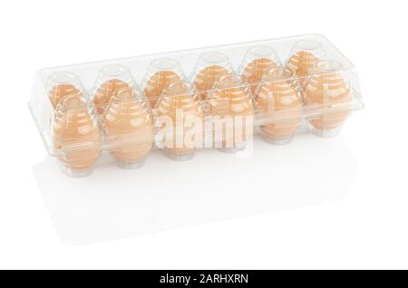 chicken eggs in a plastic container isolated on a white background, clipping path Stock Photo