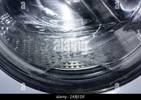Water in the washing machine drum close up, background for text Stock Photo