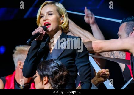 Famous Russian singer Polina Gagarina sings in front of participants in the business forum Stock Photo