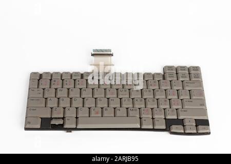 Part of laptop, laptop keyboard on white background. Stock Photo