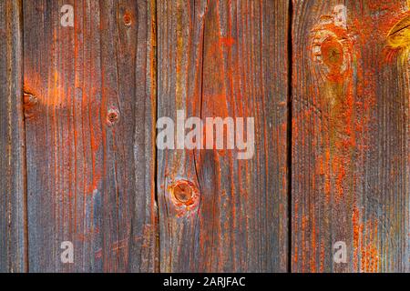 Old red painted board background. Wood panels on a rustic barn Stock Photo