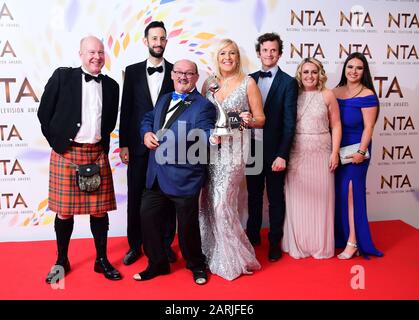 Brendan O'Carroll, Josh Cole, Jennifer Gibney and cast members, accepting the Comedy award for 'Mrs Brown's Boys' in the press room during the National Television Awards at London's O2 Arena. Stock Photo