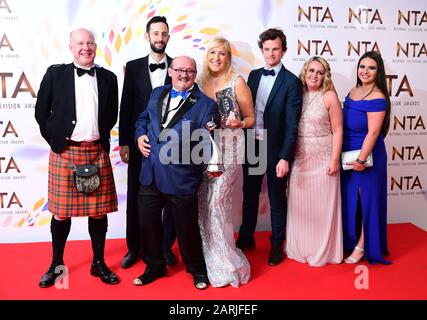 Brendan O'Carroll, Josh Cole, Jennifer Gibney and cast members, accepting the Comedy award for 'Mrs Brown's Boys' in the press room during the National Television Awards at London's O2 Arena. Stock Photo