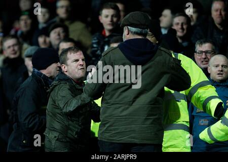 London, UK. 28th Jan, 2020. Fans exchange blows during the Sky Bet Championship match between Brentford and Nottingham Forest at Griffin Park, London, England on 28 January 2020. Photo by Carlton Myrie. Credit: PRiME Media Images/Alamy Live News Stock Photo