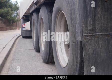 Damaged 18 wheeler semi truck burst tires by highway street, with ...