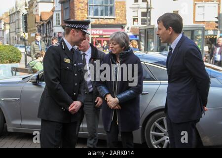 British Prime Minister, Theresa May, visiting Salisbury after the first Salisbury Russian Spy Poisoning Novichok incident in March 2018.  Welcomed by Wiltshire Police Chief Constable, Kier Pritchard and Salisbury MP, John Glen they visited The Mill pub, The Maltings Shopping Centre, and Zizzi restaurant. Stock Photo