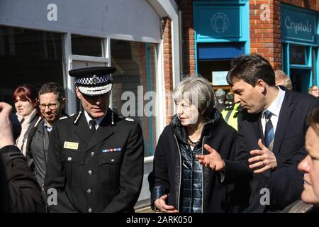 British Prime Minister, Theresa May, visiting Salisbury after the first Salisbury Russian Spy Poisoning Novichok incident in March 2018.  Welcomed by Wiltshire Police Chief Constable, Kier Pritchard and Salisbury MP, John Glen they visited The Mill pub, The Maltings Shopping Centre, and Zizzi restaurant. Stock Photo