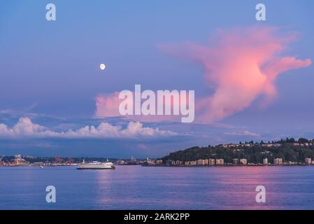 Washington State Ferry crossing Puget Sound at twilight from Seattle, Washington Stock Photo