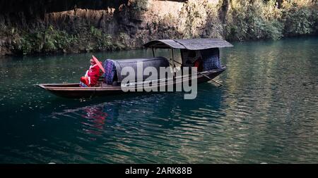 YICHANG, HUBEI / CHINA - DEC 25 2019:  The actress wear the chinese traditional for show the tradition life and China promoted the travelling spot at Stock Photo