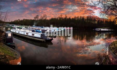 Moored narrowboats at Anderton marina, Trent and Mersey canal, Cheshire, Uk. Stock Photo