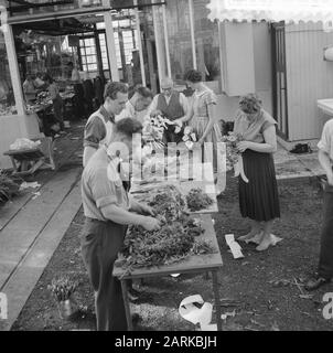 Final exam of the two-year flower arranging course in Amsterdam, the candidates working on their exam pieces Date: June 3, 1959 Stock Photo
