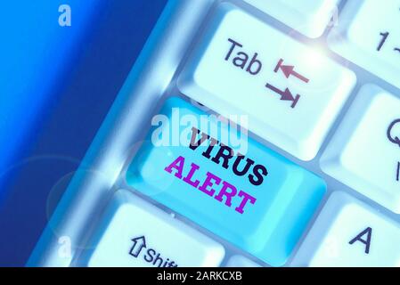 Handwriting text writing Virus Alert. Conceptual photo message warning of a nonexistent computer virus threat Stock Photo