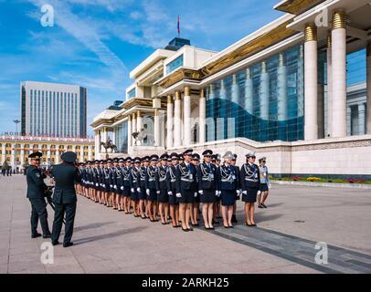 Female police officers marching ceremonial parade at Government Palace, Sükhbaatar Square, Ulaanbaatar, Mongolia