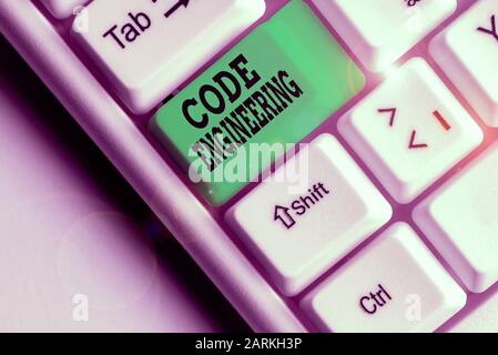 Conceptual hand writing showing Code Engineering. Concept meaning application of engineering to the development of software Stock Photo