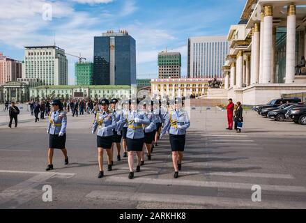 Female police officers marching in ceremonial parade at Government Palace, Sükhbaatar Square, Ulaanbaatar, Mongolia