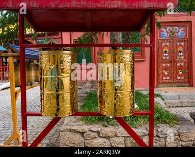 Gold prayer wheels, Gandan Monastery, Ulaanbaatar, Mongolia, Asia Stock Photo