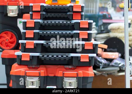 Tool bags in different sizes. For putting materials such as screws, nuts in various sizes. It has orange and black colors. It is unused and new. Stock Photo