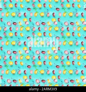 Abstract seamless pattern with flying colored macaroons, holiday concept Stock Photo