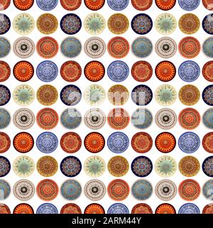 Seamless background from a set of decorative ceramic dishes hand-painted with acrylic paints with a floral pattern. Stock Photo