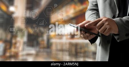 man use digital phone  typing on phone tablet smartphone Searching Browsing Internet internet of things (IoT) Stock Photo