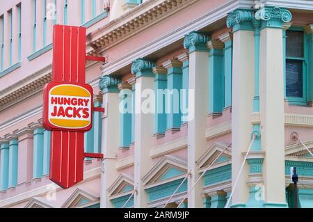 Brisbane, Queensland, Australia - 21st January 2020 : Hungry Jack's logo hanging from the facade of the restaurant in Queenstreet Mall in Brisbane, Au Stock Photo
