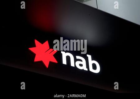 Brisbane, Queensland, Australia - 21st January 2020 : View of an illuminated NAB (National Australian Bank) hanging in front of the entrance in Brisba Stock Photo