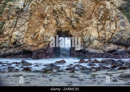 Keyhole Rock at Pfeiffer Beach, Big Sur, California #KeyholeRock #PfeifferBeach #BigSur Stock Photo