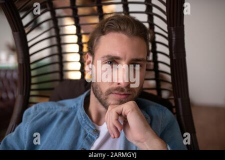Thoughtful handsome man thinking about important task Stock Photo