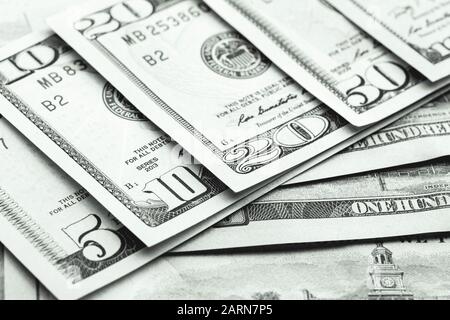 Close up view of dollar bills of different denominations. Studio shot Stock Photo