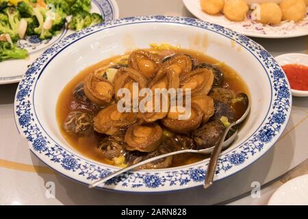 Chinese restaurant, Abalone dish, Hong Kong, China. Stock Photo