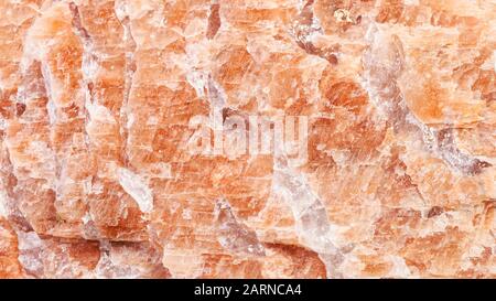 panoramic background from polished natural brown Pegmatite rock close up Stock Photo