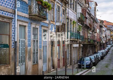 Residential buildings with Azulejo tiled facades on Rua do Sol street in Porto city on Iberian Peninsula, second largest city in Portugal Stock Photo