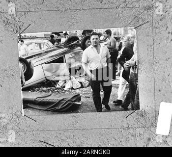 Wounded woman on the ground in a road accident in France Date: 19 June 1969 Location: France Keywords: road accidents, women Stock Photo