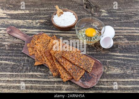 Homemade healthy Crispy crackers with poppy. Healthy food concept. Healthy snack. Stock Photo