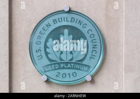 A US Green Building Council LEED Platinum plaque indicating a building has achieved compliance with different aspects of sustainability and resiliency Stock Photo