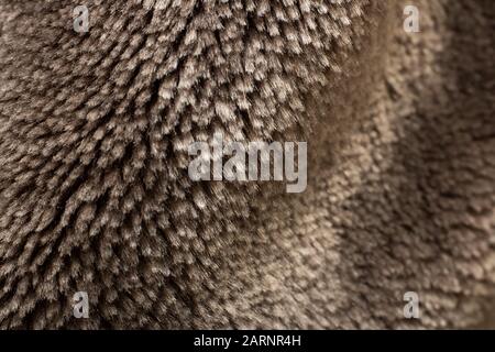 Brown artificial fur close-up, texture or background