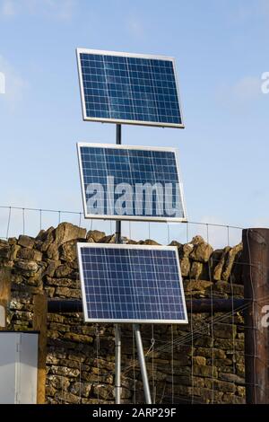 Small solar panels provide electricity to a remote rural location in Oxfordshire, UK Stock Photo