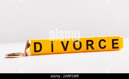 Word Divorce made of plastic letters on the table Stock Photo