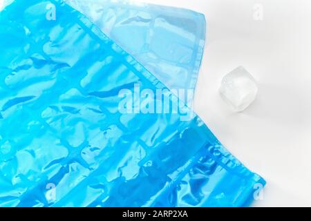 blue plastic Ice Cube Bags Disposable, Ice Cube Mold Trays Self-Seal Faster Freezing Maker on white background Stock Photo