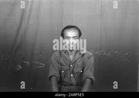 Portrait photos (miscellaneous) [passport photos]  Indonesian man in uniform Date: 1947/01/01 Location: Indonesia, Dutch East Indies Stock Photo