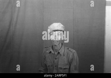 Portrait photos (miscellaneous) [passport photos]  Indonesian man in uniform Date: 1947/01/01 Location: Indonesia, Dutch East Indies Stock Photo