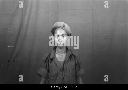 Portrait photos (miscellaneous) [passport photos]  Indonesian man in uniform Date: 1947 Location: Indonesia, Dutch East Indies Stock Photo