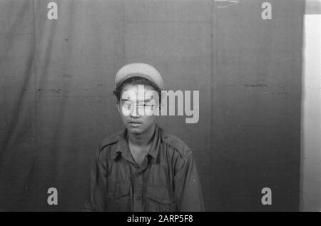 Portrait photos (miscellaneous) [passport photos]  Indonesian man in uniform Date: 1947/01/01 Location: Indonesia, Dutch East Indies Stock Photo